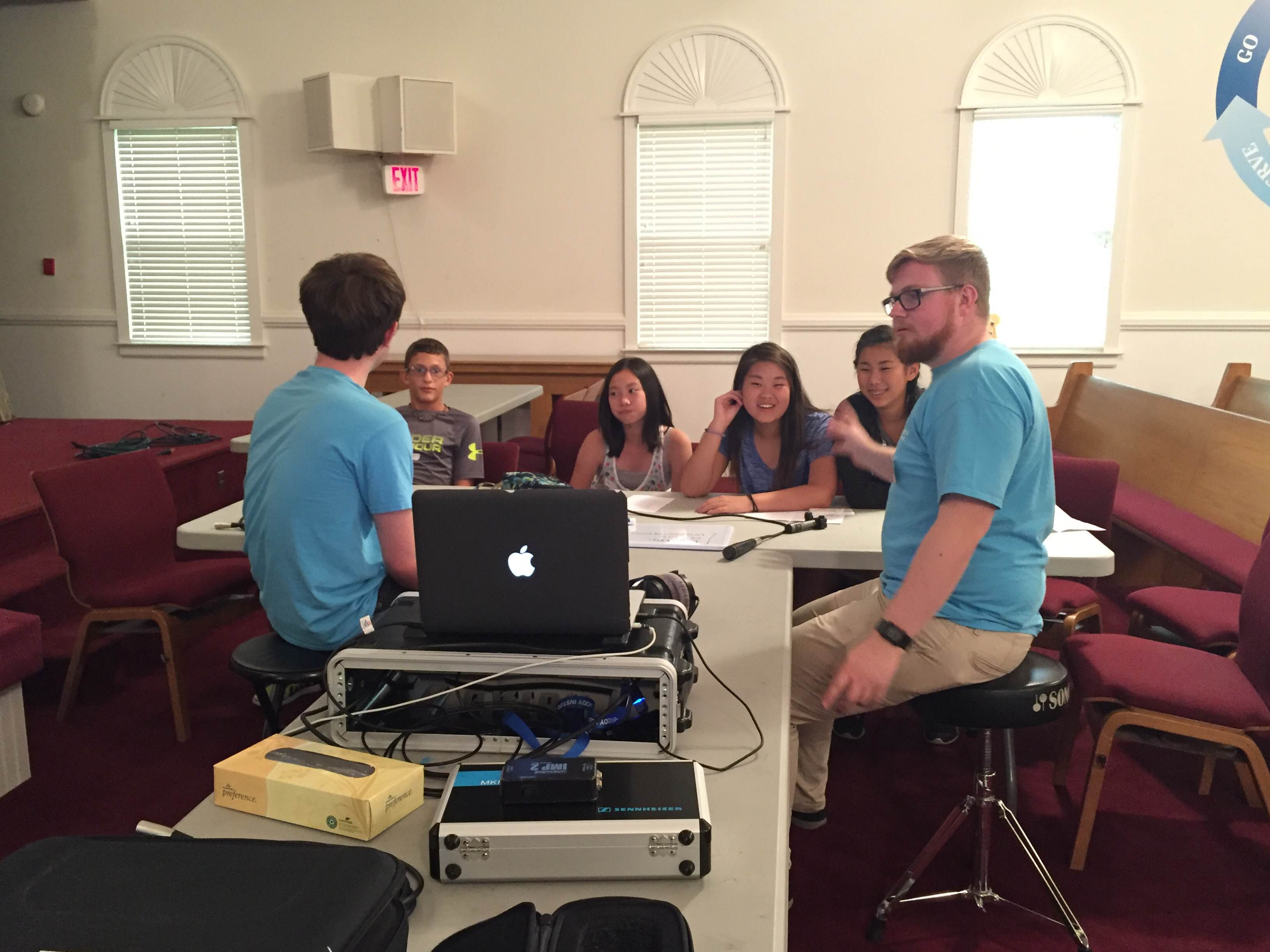 Instructors Dan and Gabe teach a group of students in their Studio Recording class